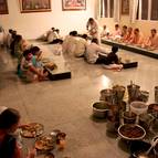 Devotees taking prasadam