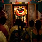 Devotees and Guests Taking Darsana