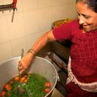 Prema-manjari Mataji Cooking Sambhar for the Offering