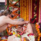 Gaura Gopala Prabhu Offering a Garland