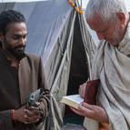 Srila Guru Maharaja Autographs a Copy of the Gita for Sacchidananda Prem Swamiji