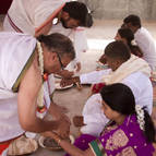 Devotees Tie 'Kautukas' on the Participants Wrists