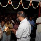 Caitanya Dasa Taking the Arati Lamp Around