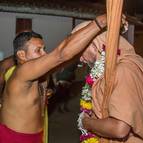 A Pujari Offers a Garland to Maharaja