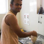 Rasikananda making puris