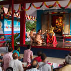 Devotees watching the abhiseka