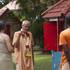 Srila Guru Maharaja Talking to Devotees Near Govardhana Hill